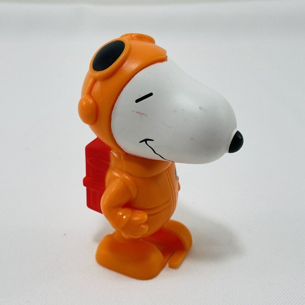 McDonald Peanuts Snoopy Astronaut NASA Wind Up Toy Figure Walk Move Orange Suit